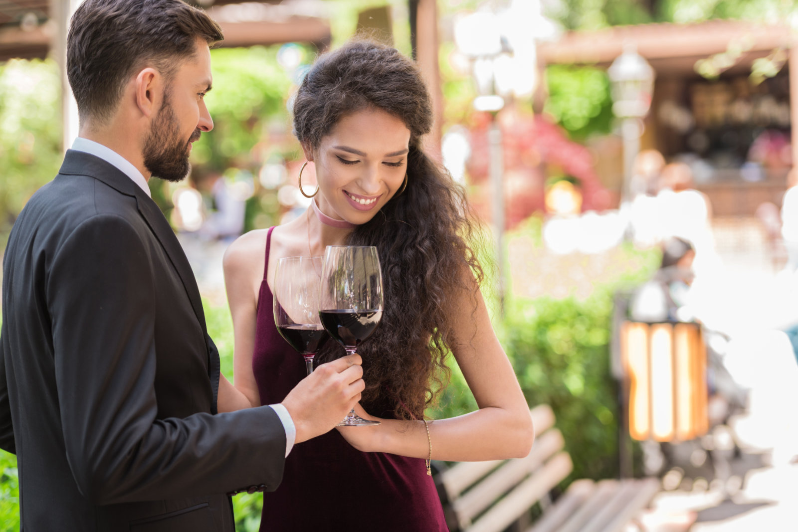 couple-having-romantic-date-standing-in-garden